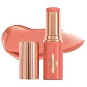 Charlotte Tilbury  Unreal Lip + Cheek Glow Blush Stick with Hyaluronic Acid